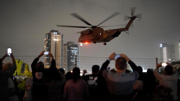 Hamas releases third group of hostages, plans to extend truce