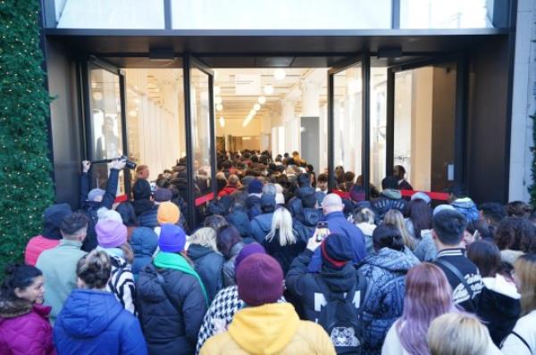 Shoppers entering Selfridges department store on London's Oxford Street as the doors open during the Boxing Day sales